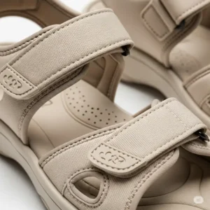 Detail shot of the adjustable hook-and-loop straps on diabetic sandals, demonstrating how they provide a customized and secure fit for various foot conditions.
