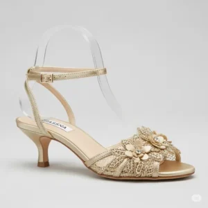 Gold kitten heel sandals for a bride, offering comfort and elegance for a wedding day.