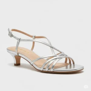 Detailed view of chic silver low heel sandals, offering both sophistication and ease of movement