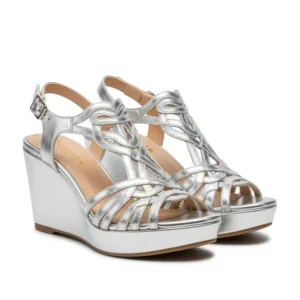 Bright silver wedge heeled sandals, a perfect choice for summer events and casual elegance