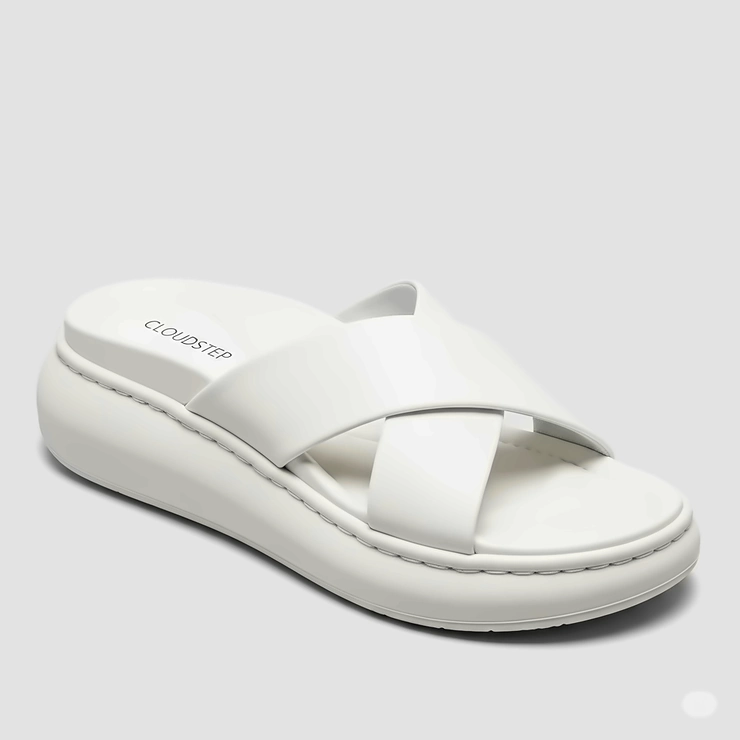 Comfort-focused white designer sandals featuring a cushioned sole for all-day wear.
